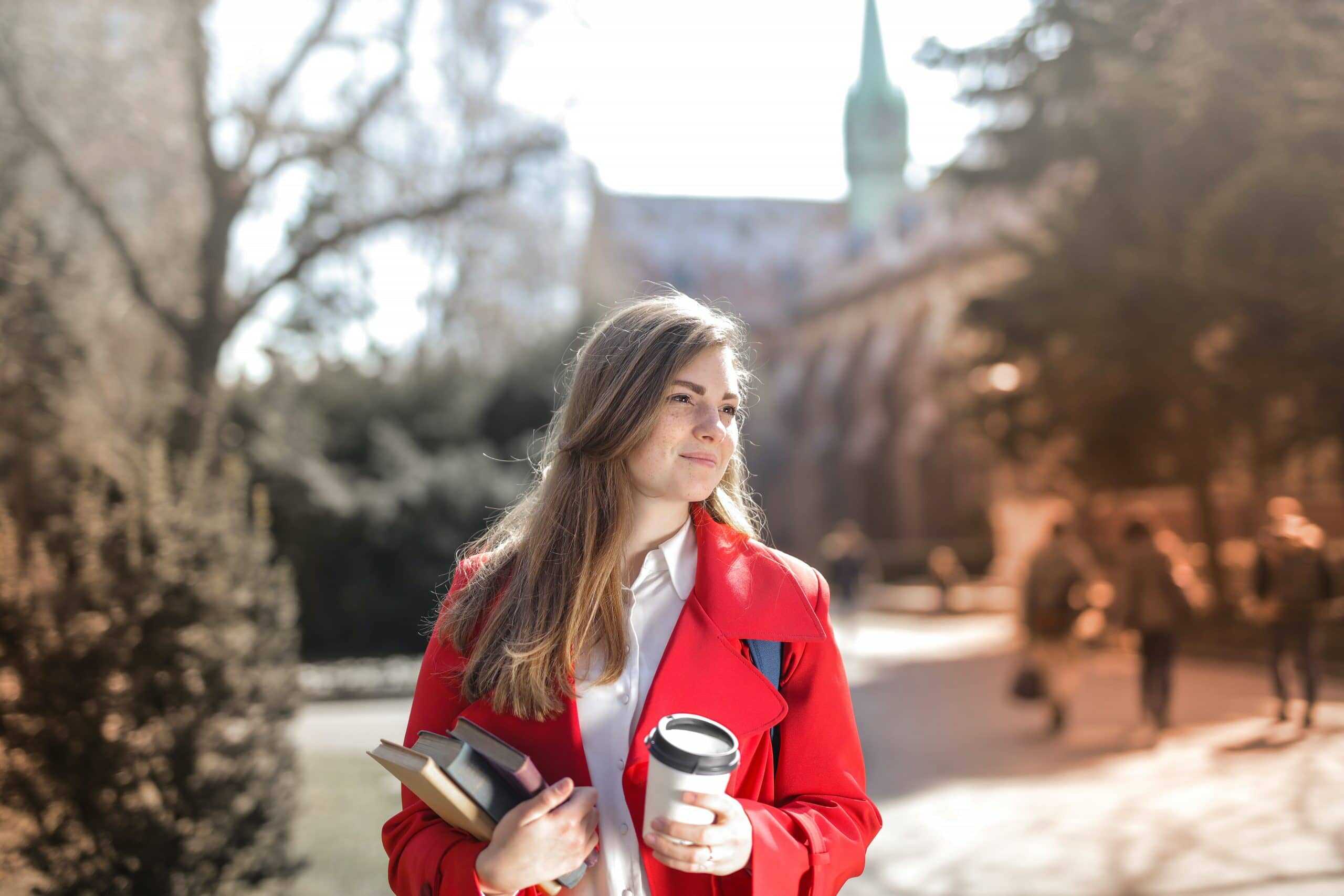 Student on campus with books